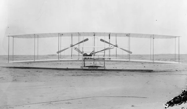 Wright Brothers' flying machine, on Kitty Hawk beach, 1903